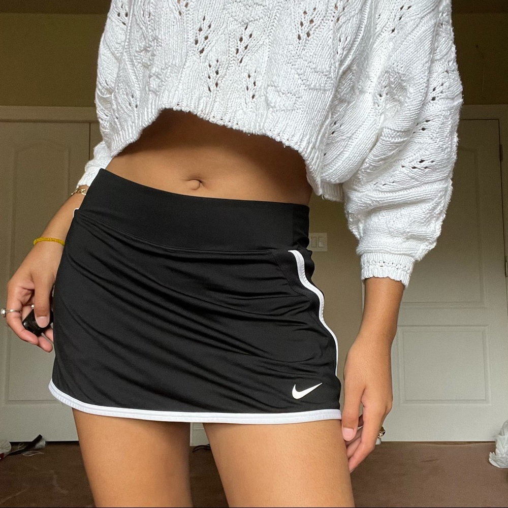 White trim black Nike skirt
